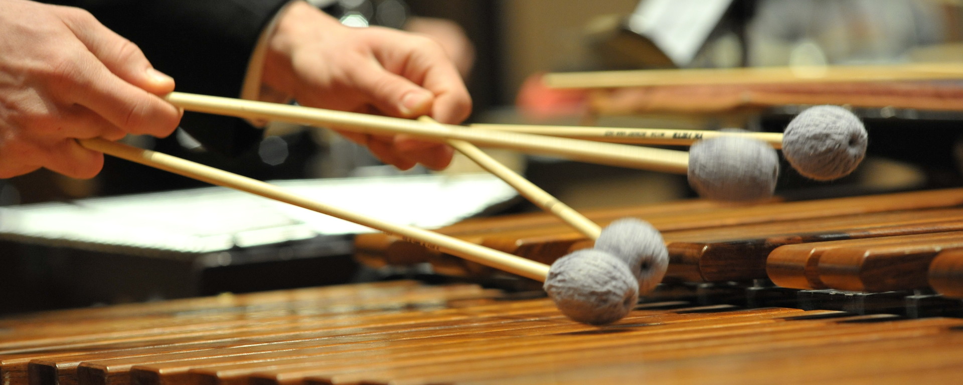 Closeup image of a person playing the xylophone